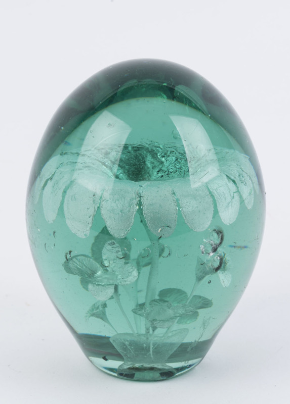 A large antique English glass dump doorstop with silver floral inclusions, 19th century, 14cm high