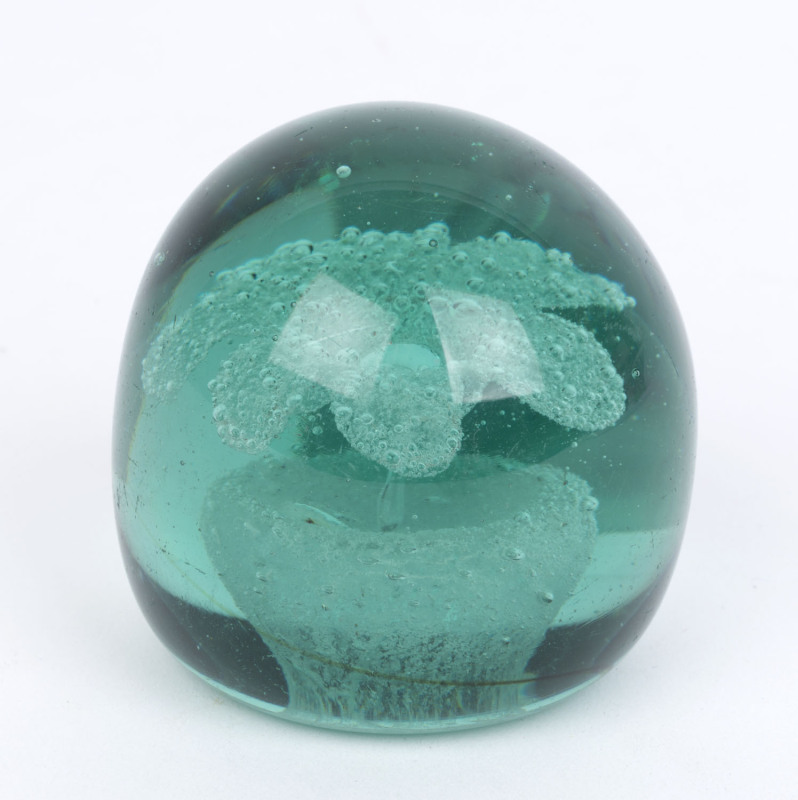 An antique English glass dump paperweight with silver floral inclusions, 19th century, 6.5cm high