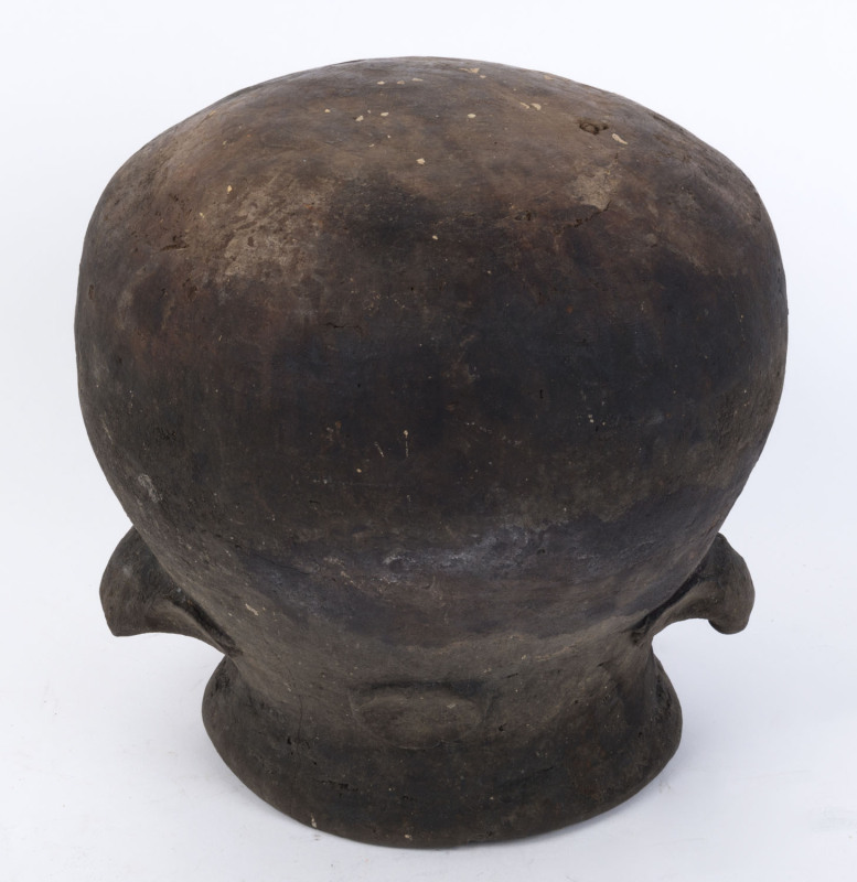 An early and well used cook pot, fired clay, Middle Sepik Region, Papua New Guinea, early 20th century, ​28cm high, 30cm wide