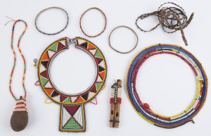 Six beadwork body ornaments and a flute, Zulu, South Africa, mid 20th century, (7 items)
