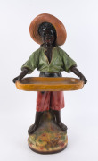 "Fruit Boy" calling card holder, painted chalk ware, early to mid 20th century, ​76cm high