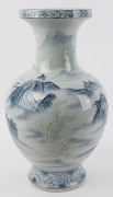 A Chinese blue and white porcelain mantel vase with embossed celadon dragons in mountain landscape, 20th century, square seal mark to base, ​53cm high - 3