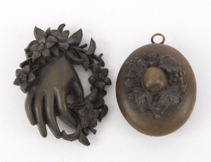 An antique jet brooch and locket, 19th century, the brooch 5.5cm wide