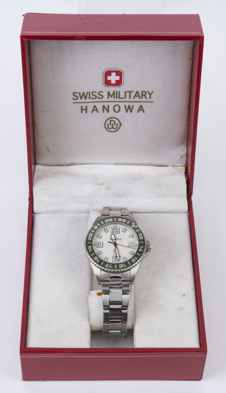 SWISS MILITARY "Hanowa" wristwatch, stainless steel case and bracelet with green bezel, in original box, 4cm wide