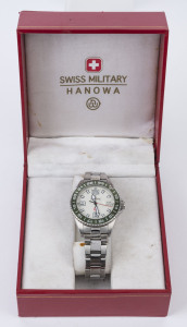 SWISS MILITARY "Hanowa" wristwatch, stainless steel case and bracelet with green bezel, in original box, 4cm wide