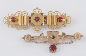 Two antique 9ct gold bar brooches set with red stones, late 19th century, 5cm and 5.5cm wide, 8.3 grams total
