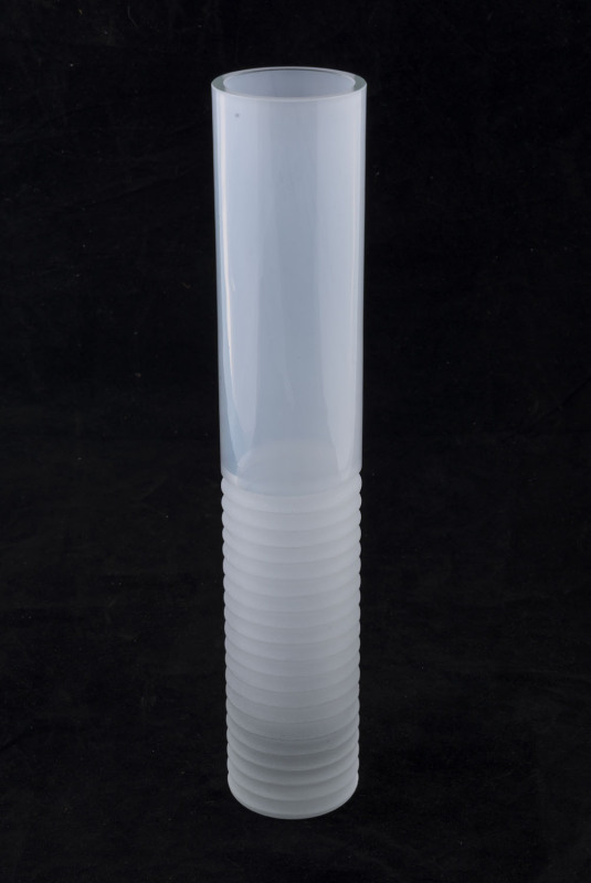 A cylindrical white art glass vase, most likely Scandinavian. ​35m high