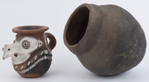 An earthenware cooking pot with incised decoration; together with a decorative earthenware pot, Papua New Guinea, (2 items), ​28cm and 16cm high