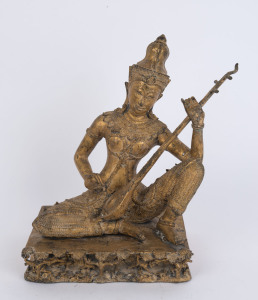 A Thai seated gilt bronze statue of a musician, 19th/20th century, ​37cm high