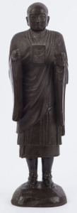 A Sino-Tibetan ceramic statue of a monk, 19th century, ​36cm high