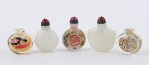 Five assorted Chinese snuff bottles including two white jade with carnelian tops, two reverse glass painted, glass and enamel decorated with peony (signed), 19th and 20th century, the largest 6.5cm high