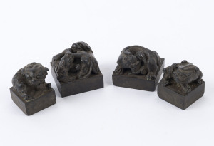 Four Chinese bronze seals with Chi-long dragon finials, Qing Dynasty, 19th century, ​the largest 3.5cm high