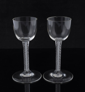 A pair of Georgian glasses with white double air twist stems, 18th century, 15.5cm high