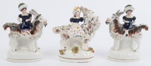 Three antique English Staffordshire pottery statues of girls riding goats, early 19th century, ​the largest 16cm high