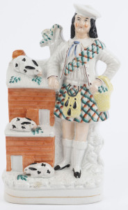 Antique Staffordshire pottery statue of a Scottish rabbit farmer, 19th century, 26cm high