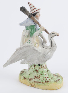 Witch and Goose Staffordshire pottery statue, 19th century, 18.5cm high