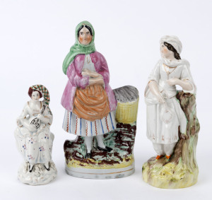 Three Staffordshire pottery statues of women, 19th century, ​the largest 23.5cm high