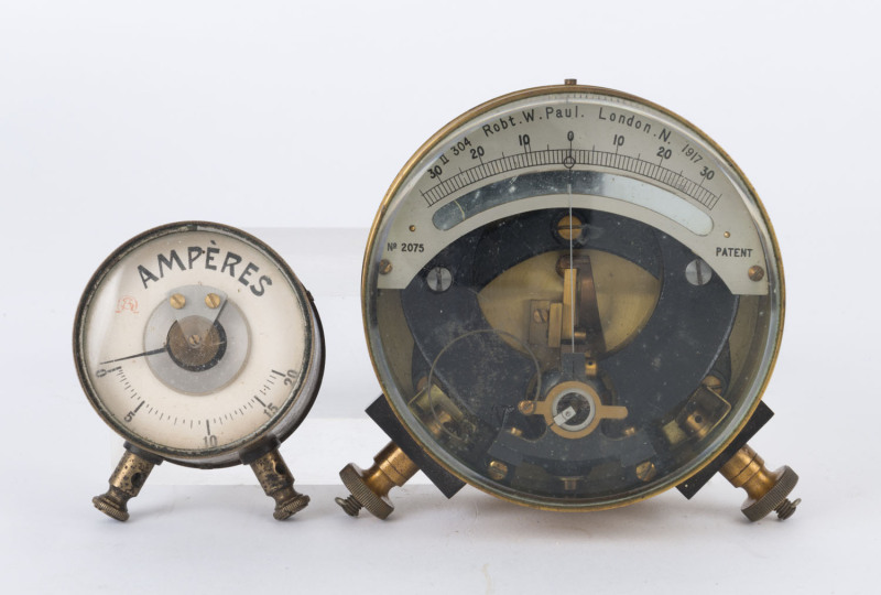 ROBERT W. PAUL PIVOTED MOVING COIL GALVANOMETER No.2701, circa 1917; together with a French brass cased Amp meter, (2 items), 10cm and 6cm diameter