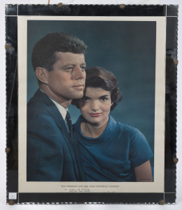 JOHN F. KENNEDY & JACQUELINE KENNEDY: lithographic reproduction print by Karsh of Ottawa, mounted on board and with mirrored surround, overall 56x46cm.