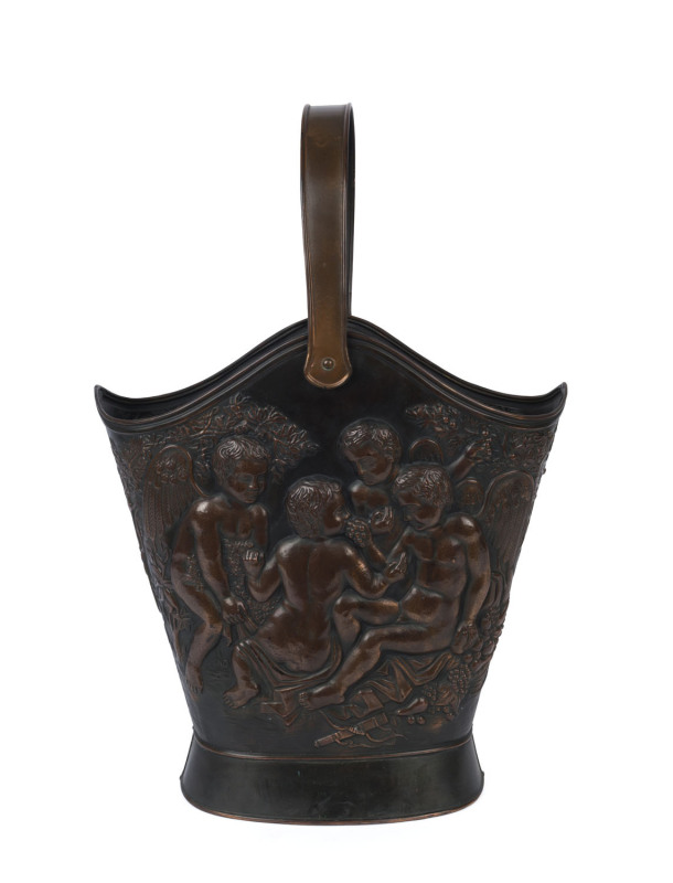 An antique embossed metal umbrella stand with cupid decoration, 19th century, 73cm high