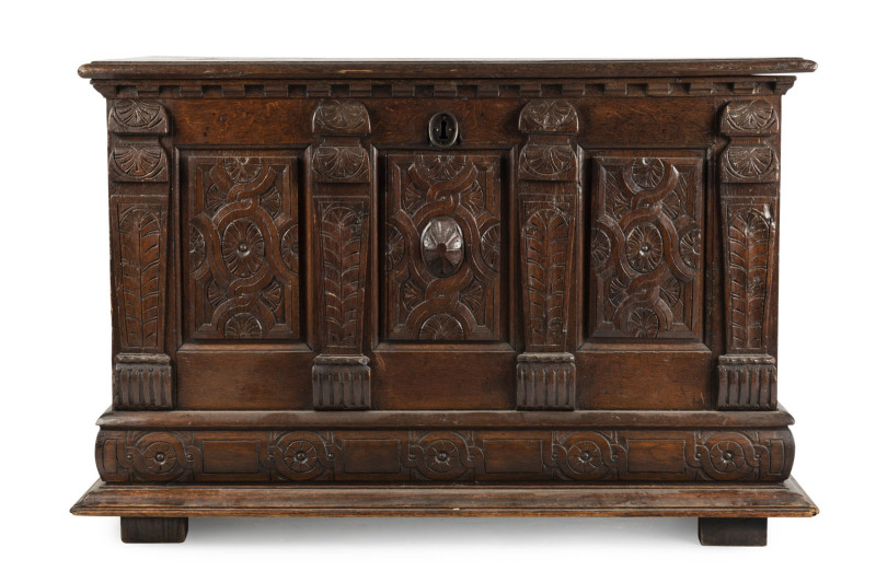 An English blanket box, interior fitted with original candle box, carved oak, circa 1760, 79cm high, 115cm wide, 58cm deep