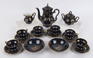 A German blue and gilt porcelain coffee set comprising six cups and saucers, coffee pot and milk jug together with two Italian bowls, 20th century, (17 items), the coffee pot 20cm high