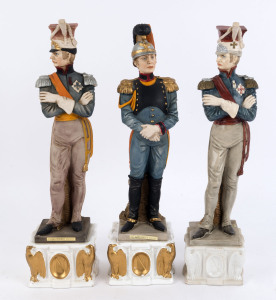 CROWN NAPLES set of three Italian porcelain Napoleonic military statues, 20th century, blue factory mark and foil labels, the tallest 36cm high