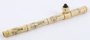 A Chinese opium pipe, turned and carved bone, 19th/20th century, 33cm long