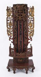 An antique Chinese dragon stand, carved and lacquered wood with gilded highlights, Qing Dynasty, circa 1900, 101cm high