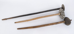 Three stone headed war clubs, Papua New Guinea, early to mid 20th century, ​the largest 93cm long