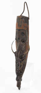 Early Kwai mask, carved wood, boar tusk, shell, clay and natural earth pigments, Korogo village, Middle Sepik, Papua New Guinea, early to mid 20th century. ​55cm high
