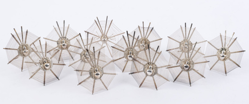 Set of 12 Chinese silver place name holders in the form of spiders in webs, early 20th century, 5.5cm high, 180 grams total