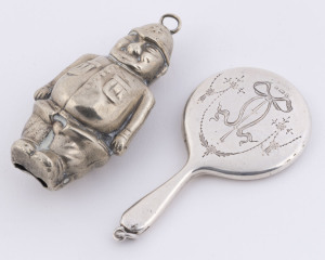 A silver plated policeman baby rattle together with an antique sterling silver miniature mirror, (2 items), the larger 8cm high