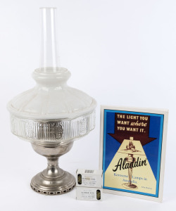 ALADDIN nickel plated oil lamp with original glass shade; together with two spare Aladdin wicks and a book "ALADDIN KEROSENE LAMPS IN AUSTRALIA" by Allin Hodson [Hyde Park Press], (4 items), ​the lamp 58cm high