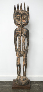 A spirit figure, carved wood with shell eyes and earth pigment decoration, Papua New Guinea, ​129cm high
