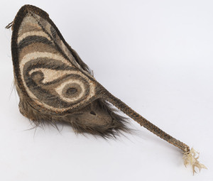 Long nose Tambuan mask, woven cane and feather with ochre decoration, Blackwater River, Papua New Guinea, ​42cm high, 82cm long