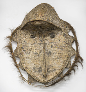 Gable mask, woven cane, wood, feather and fibre with remains of earth pigment decoration, Kuvenmas Village, Blackwater Lakes, Papua New Guinea, 120cm high