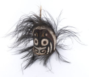 A ceremonial headdress, feather, woven cane and wood with earth pigment decoration, Papua New Guinea, 39cm high