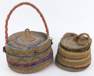 Two tribal baskets, woven fibre and coloured yarn, one with nut adornments, ​36cm and 18cm high