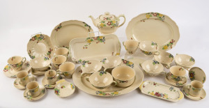 ROYAL DOULTON English porcelain dinner ware and table ware, circa 1930s. Complete dinner set for 8 people, plus 6 teacups and 4 coffee cups, (86 pieces).