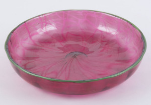 An antique ruby glass bowl with applied green rim, circa 1900, 5cm high, 25cm wide