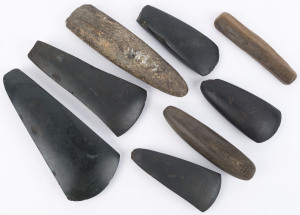 Group of eight assorted stone axe heads and tools, Papua New Guinea, ​the largest 26cm long