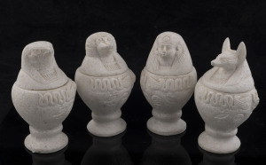 Set of four reproduction Egyptian canopic jars, 20th century, 13cm high