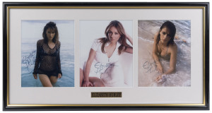 ELIZABETH HURLEY: window mounted display featuring three signed colour photographs of the actress, with the original Ed Bedrick (USA) invoices for the three photographs; attractively framed & glazed, overall 78x41cm.