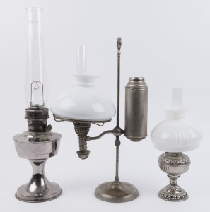 Three nickel plated kerosene lamps, early 20th century, the largest 61cm high