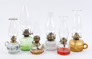 Six portable kerosene lamps, early 20th century, (6 items), the largest 33cm high,