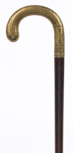 A fine antique walking stick with three toned gold finish and niello handle on snakewood shaft, possibly Russian, 19th century, 90cm high