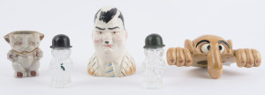 Mostly ceramic group with Oliver Hardy pepper pot, "Kilroy was here" shelf sitter (marked 'Renate Australia'), Japanese made "puppy dog" brush pot (repaired), ribbed porcelain vase (height 15cm); also glassware salt & pepper shakers; mid 20th century. (6 