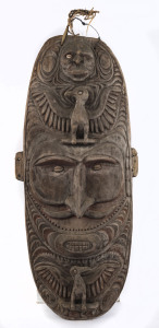 Gopi spirit board, carved wood, shell and fibre with remains of painted decoration, Papua New Guinea, ​112cm high
