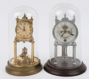 Two 400 day clocks comprising a Japanese "DIAMOND" trade mark NISIMURA, TAKAMATU kit form brushed steel anniversary style clock with exposed escapement on a timber base under a glass dome; and a GERMAN brass cased 400 day clock with rotary disk pendulum a